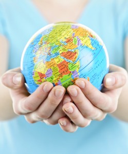 Hands holding globe